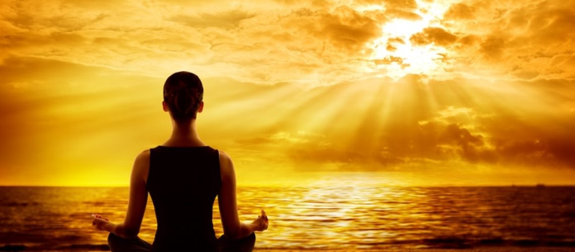 Yoga Meditating Sunrise, Woman Mindfulness Meditation in Nature, Back View on Beach